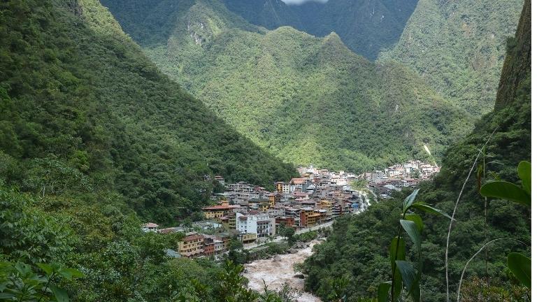 Looking down to Aguas Calientes and river valley surrounded by mountains