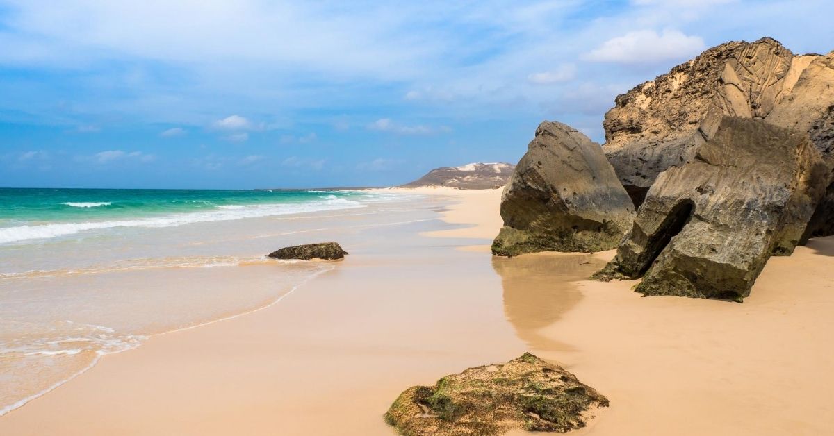 beautiful beach with huge rocks and turquoise waters
