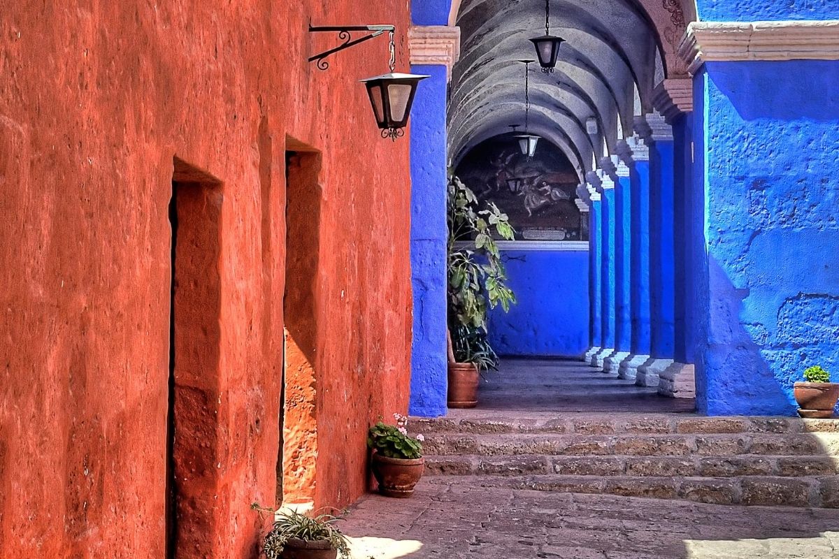 Spanish colonial architecture in bright colors of red, blue and white at Santa Catalina monastery