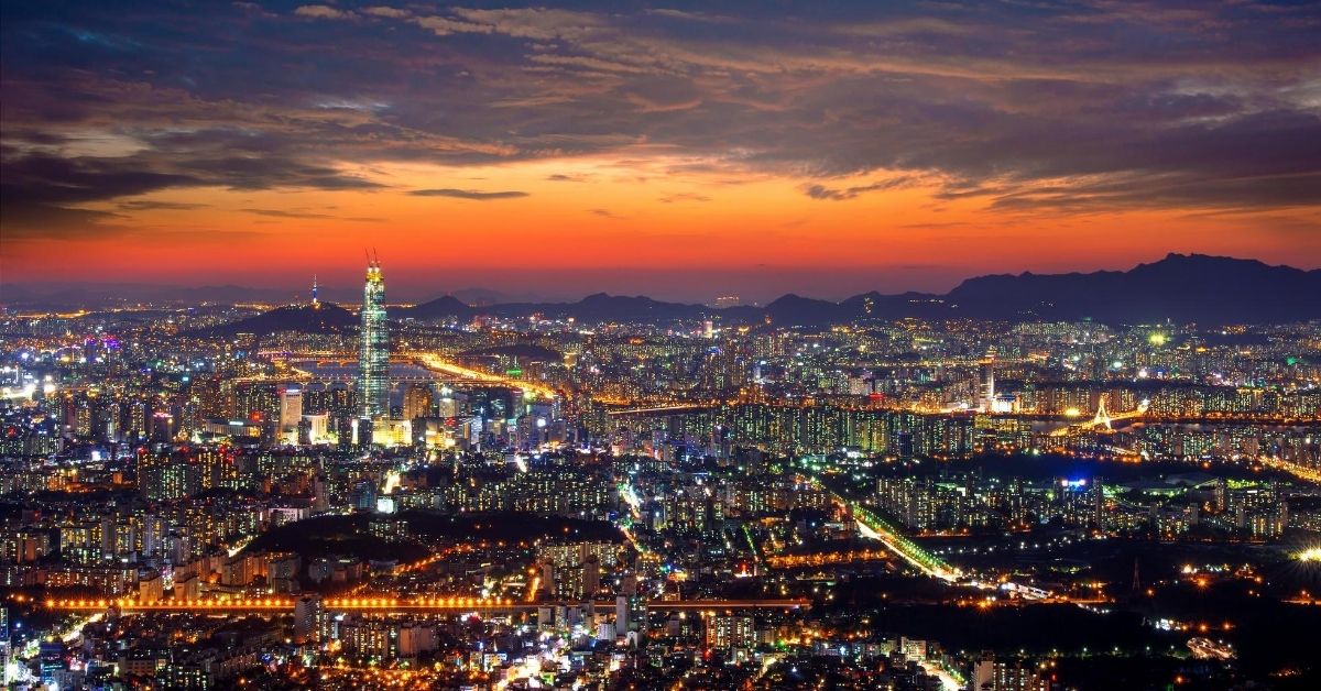 dramatic sky after sunset over Seoul illuminated by city lights