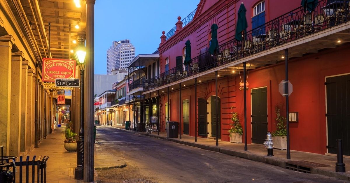 colorful shops and restaurants along street in the French Quarter