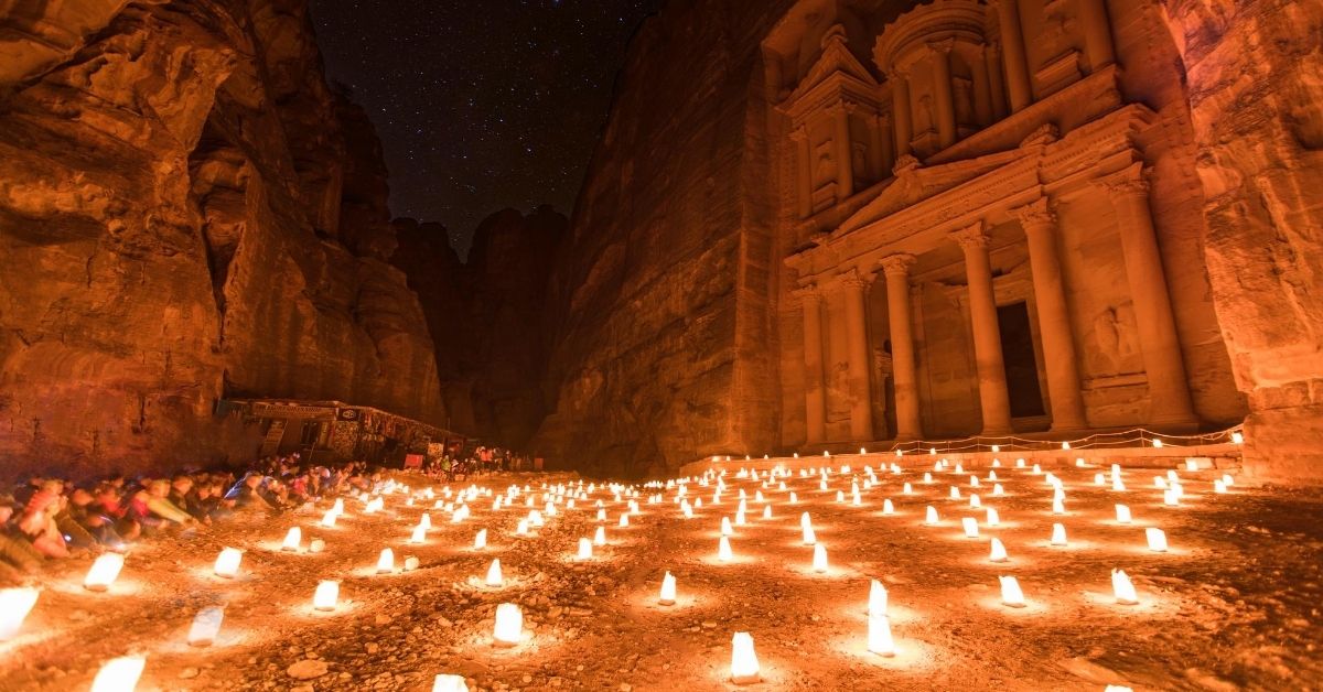 candles in front of Petra at night