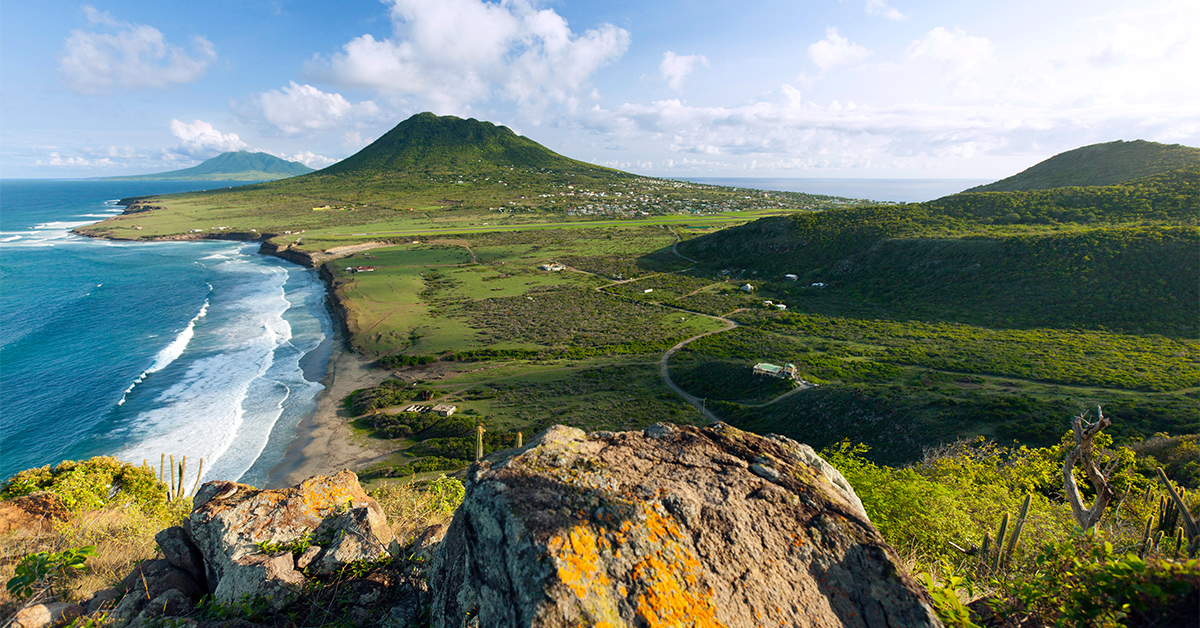 view from top of mountain down to Statia island in the Caribbean